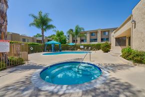 La Mesa apartment for rent - A small pool with a ladder in the middle of it.