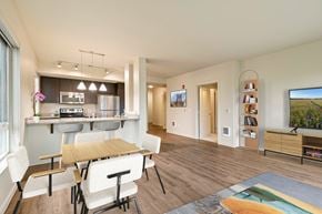 Kirkland apartment for rent - A modern kitchen with a dining table and chairs.
