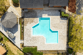 Memphis apartment for rent - An aerial view of a house with a blue pool in the backyard.