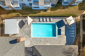 Memphis apartment for rent - A swimming pool surrounded by a concrete patio and steps.