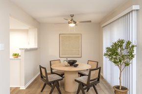 Millington apartment for rent - A dining room with a round table and chairs.