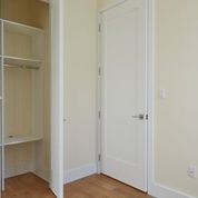 Brooklyn apartment for rent - A white door is in a room with a white wall.