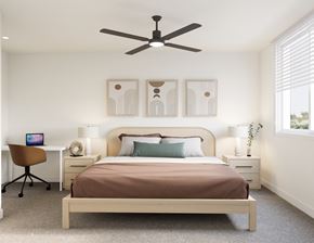Avondale apartment for rent - A bedroom with a bed, desk, chair, and ceiling fan.