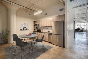 Los Angeles apartment for rent - A modern kitchen with a dining table and chairs.