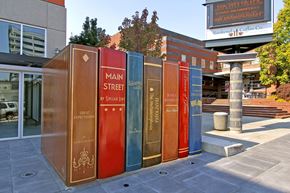 Everett apartment for rent - A row of books are lined up outside a building.