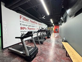 Fitness center with cardio equipment and free weights