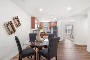Chesterfield apartment for rent - A dining room with a table and chairs.