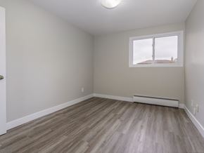 Kitchener apartment for rent - A room with a window and a door.
