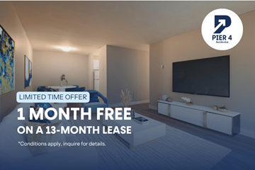 Bedford apartment for rent - A living room with a television and a flat screen monitor on the wall.