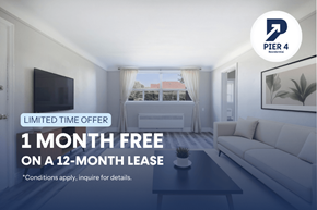 Hamilton apartment for rent - A living room with a 1 month free offer on a 12-month lease.