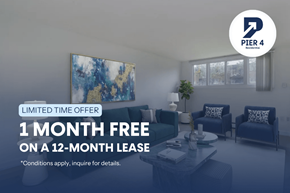 Kitchener apartment for rent - A living room with a 1 month free on a 12-month lease offer.