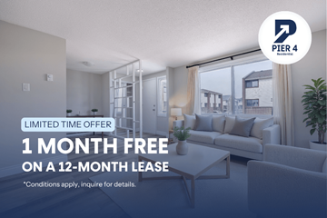 Kitchener townhouse for rent - A living room with a 1 month free offer on a 12-month lease.