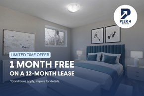London apartment for rent - A bedroom with a bed, nightstands, and pictures on the wall, advertising a limited time offer for a free month on a 12-month lease.