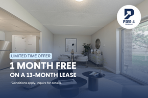 Thorold apartment for rent - A room with a sign that says "PIER 4 Business" and a "1 MONTH FREE ON A 13-MONTH LEASE" offer.