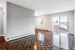 Hamilton apartment for rent - A room with a tiled floor and a sliding glass door.
