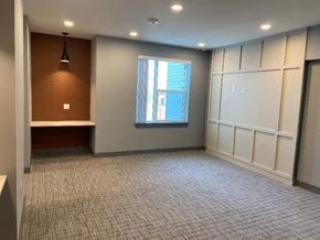 Suitland apartment for rent - A room with a window and a tiled floor.