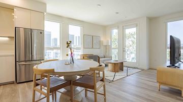 Los Angeles apartment for rent - A modern kitchen with a dining table and chairs.