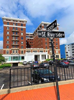 Evansville apartment for rent - a street sign in front of a parking lot