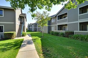 Brentwood apartment for rent - Apartment complex with a walkway in the foreground.