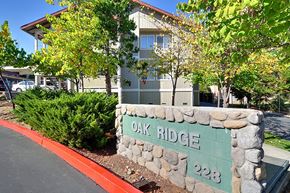 Grass Valley apartment for rent - A sign that says Oak Ridge 228 in front of a building.