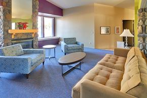 Oroville apartment for rent - A living room with a fireplace and a couch.