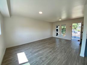 Los Angeles apartment for rent - A room with a wooden floor and a window.