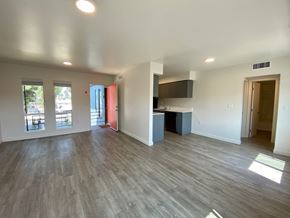 Los Angeles apartment for rent - A room with a grey floor and white walls.