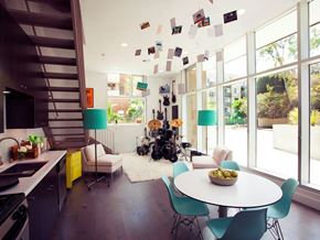 Los Angeles apartment for rent - A modern kitchen with a dining table and chairs.at 1800 Whitley, Los Angeles, CA 90028