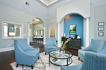 Living room with blue chairs