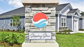 Little River apartment for rent - A sign for a place called Stopping Stone is in front of a house at Stepping Stone at Bridgewater Apartments, Little River, SC, 29566