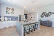 Little River apartment for rent - A kitchen with a bar area and a counter with stools. at The Banks at Bridgewater Apartments, South Carolina