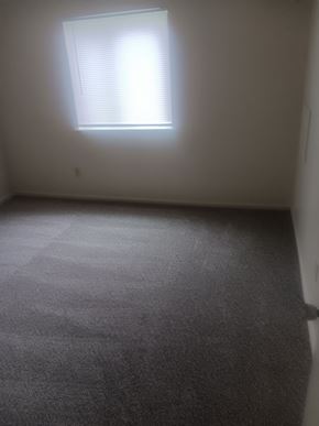 Roanoke apartment for rent - A carpeted room with a window.