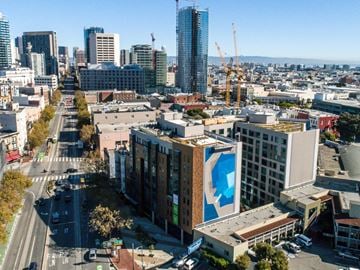 San Francisco apartment for rent - A cityscape with a large building under construction in the foreground.
