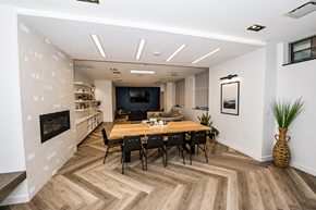 Halifax apartment for rent - A modern dining room with a wooden table and chairs.