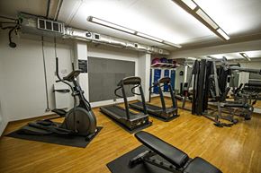 Halifax apartment for rent - A gym with a variety of equipment including treadmills, weights, and exercise machines.
