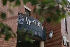 Halifax apartment for rent - A brick building with a sign that says Waterford.