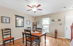 Wrightsville apartment for rent - A dining room with a wooden table and chairs.