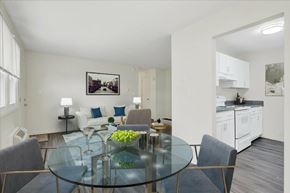 Dover apartment for rent - A modern dining room with a glass table and chairs.