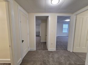 Wrightsville apartment for rent - A room with white walls and carpeted floor.