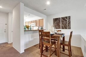 Richmond apartment for rent - A dining room with a table and chairs.