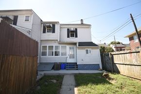 Wrightsville apartment for rent - A house with a white exterior and a blue door.