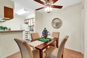 Glenallen apartment for rent - A dining room with a table set for four.