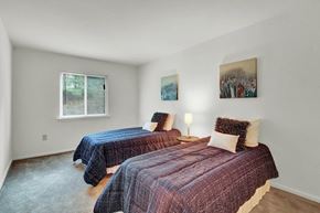 Harrisburg apartment for rent - A bedroom with two beds and a window.
