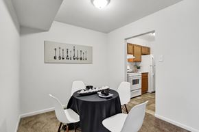 Hagerstown apartment for rent - A dining room with a table set for two.