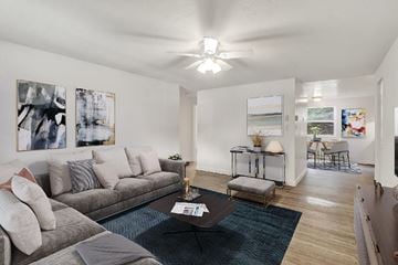 York apartment for rent - A living room with a grey couch and a coffee table.