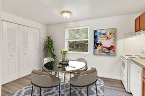 York apartment for rent - A dining room with a table and chairs.