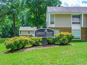Chester apartment for rent - A sign for Lakeview Manor Apartments stands in front of a building.