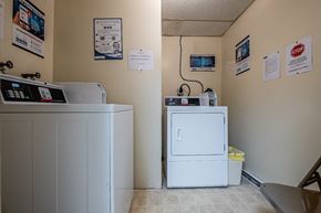 Duncannon apartment for rent - A white refrigerator is in a room with a white wall and a white floor.