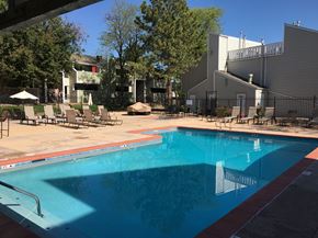 Englewood apartment for rent - A swimming pool with pool chairs.