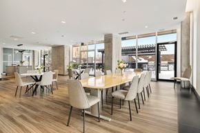 Ottawa apartment for rent - A conference room with a long table and chairs.
